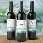 Nature Mountain Pine Trees Personalized Wine Label<br><div class="desc">Personalized wine labels are perfect for adding a unique custom touch to your table wine, wedding favours or welcome gifts. Classy elegant design for fall or winder weddings features watercolor mountain with pine trees. your names, wedding date and wine varietal or custom message in elegant lettering. Designed to coordinate with...</div>
