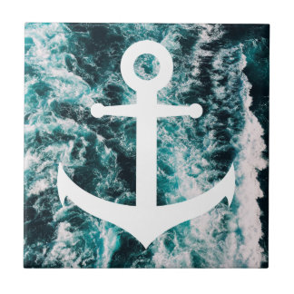 Nautical anchor on ocean photo background tile