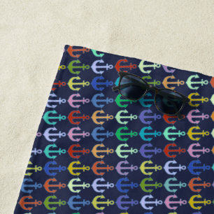 nautical colourful anchors on blue beach towel