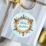 Nautical Merry Christmas Ship Wheel Classic Round Sticker<br><div class="desc">This nautical Merry Christmas sticker features a watercolor ship's wheel decorated for the holidays, on an aqua blue watercolor texture background. It is perfect for envelope seals, gift tags, decor, and more. Check out the collection for matching products, and feel free to message me through Zazzle Chat if you need...</div>