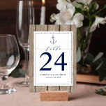 Nautical Navy Blue Anchor Rustic Wood Wedding Table Number<br><div class="desc">When you are having a beach-inspired wedding and you want a little rustic flare this wedding suite accomplishes both. This design features a rustic wood background,  a dash line border,  and a nautical navy blue anchor.</div>