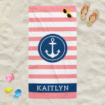 Nautical Personalized Name Navy Pink Striped Beach Towel<br><div class="desc">Personalized beach towel design features a nautical design with round framed boat anchor and custom text in simple and modern serif lettering that can be personalized with a first name. Navy blue circle design and text frame contrasts a striped pink and white background with a stylish pattern of horizontal stripes....</div>