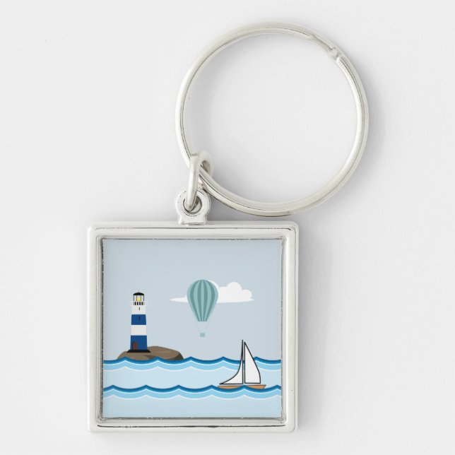 Nautical Scene with Lighthouse and Sailboat Keychain (Front)