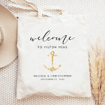 Nautical Wedding Welcome Gold Tote Bag<br><div class="desc">This nautical destination wedding hotel or favour bag features a silhouette illustration of an anchor in gold faux foil, under the word "welcome" in elegant black handwriting script. Personalize it with your wedding location, the names of the bride and groom, and the wedding date. Perfect for a boat, yacht, coastal...</div>