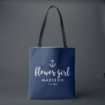 Nautical Wedding White Anchor Custom Flower Girl Tote Bag<br><div class="desc">Surprise your Flower Girl with this personalized tote bag featuring a nautical design with a white anchor set against a navy background. Customize by adding her name and your wedding date. A great size for wedding essentials: extra clothing, shoes, snacks, water, etc. The perfect go-to bag for a nautical, beach...</div>