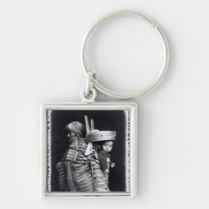 Navaho woman carrying a papoose on her back keychain