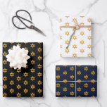 Navy Black And White Hanukkah Golden David Star Wrapping Paper Sheet<br><div class="desc">Experience the elegance of a stunning golden Star of David pattern,  perfect for celebrating the festive spirit of Hanukkah. This design beautifully contrasts against black,  white,  and navy blue backgrounds,  making your holiday truly special.</div>