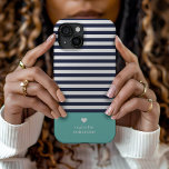 Navy Blue and Aqua Chic Stripes Heart Monogram iPhone 15 Case<br><div class="desc">Stylish custom phone case in aqua, navy blue and white colours. This design features a preppy classic navy and white striped pattern. Personalize it with your name monogram or other custom text with a cute heart symbol. Use the design tools to choose any background colours, edit the text fonts and...</div>