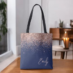Navy Blue Blush Pink Rose Gold Glitter Monogram Tote Bag<br><div class="desc">Navy Blue and Pink Rose Gold and Blush Pink Faux Sparkle and Glitter Elegant Monogram Book Bag. This Book Bag can be customized to include your initial and first name and given as a gift for Christmas,  Sweet 16 Birthday,  Bridal Shower or a Wedding.</div>