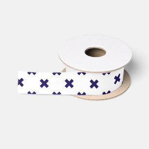Navy blue cross stitches on white satin ribbon