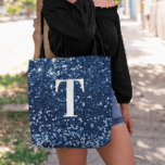Navy Blue Faux Glitter Bokeh Sparkly Monogram Tote Bag<br><div class="desc">A modern bold single letter monogram in white with a black drop shadow. The font size, colour and style are customizable. The background is a faux dark navy blue glitter with sparkly spots or bokeh. Move or delete the tiny faux sparkle graphic images. Girly chic gift for a bridesmaid or...</div>