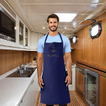 Navy blue gold anchor custom name nautical apron<br><div class="desc">Navy blue background and a faux gold anchor as decor.  Template for a name,  written with a maritime style rope font,  golden letters.</div>