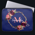 Navy blue gold geometric florals monogram laptop sleeve<br><div class="desc">A chic navy blue background. A faux gold geometric frame decorated with watercolored flowers,  roses in burgundy and pink and boho style feathers.  Templates for Your name and monogram letter.  The name in pink is written with a modern and trendy hand lettered style script.  The monogram letter in coral.</div>