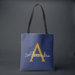 Navy Blue Gold Name Girly Script Monogram Modern Tote Bag<br><div class="desc">Navy Blue and Gold Elegant Add Your Own Name Monogram Book Bag. This Book Bag can be customized to include your initial and first name and given as a gift for Christmas,  Sweet 16 Birthday,  Bridal Shower or a Wedding.</div>