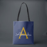 Navy Blue Gold Name Girly Script Monogram Modern Tote Bag<br><div class="desc">Navy Blue and Gold Elegant Add Your Own Name Monogram Book Bag. This Book Bag can be customized to include your initial and first name and given as a gift for Christmas,  Sweet 16 Birthday,  Bridal Shower or a Wedding.</div>