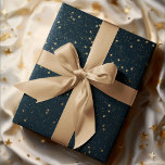 Navy Blue & Gold Stars | Christmas Wrapping Paper<br><div class="desc">This Christmas gift wrapping paper is perfect for adding a touch of elegance and sophistication to your holiday presents. Featuring a navy blue background adorned with shimmering gold stars, this wrapping paper will make your gifts stand out under the tree. The high-quality paper is durable and easy to work with,...</div>