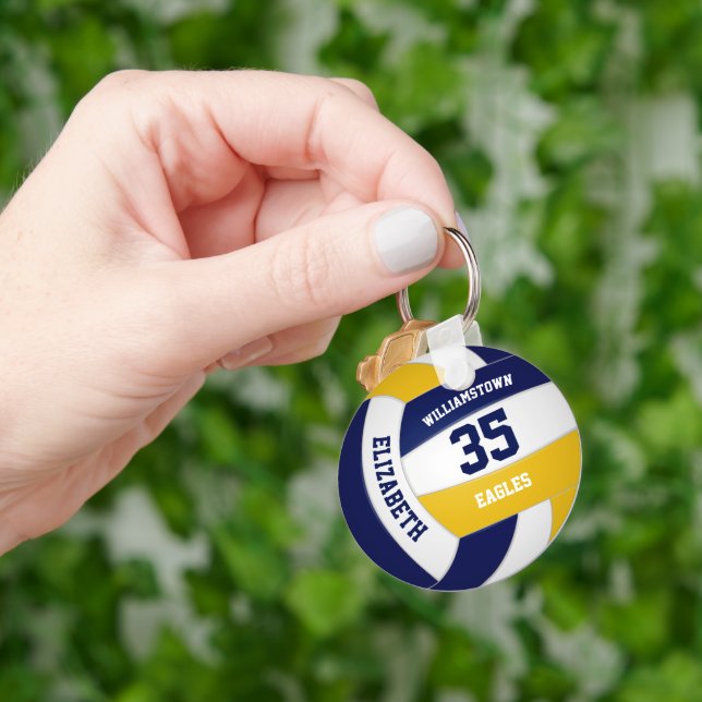 navy blue gold team colours girls boys volleyball keychain (Hand)
