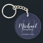 Navy Blue Modern Script Personalized Groomsmen Keychain<br><div class="desc">Add a personal touch to your wedding with personalized groomsmen keychain. This keychain features personalized groomsmen's name in white modern script font style and monogram in light navy blue modern script font style as background with title and wedding date in white modern sans serif font style on navy blue background....</div>