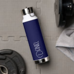 Navy Blue Modern Typography Personalized Water Bottle<br><div class="desc">Trendy, vacuum insulated water bottle that features personalized name in white, modern typography on a navy blue colour background. Personalize bottle by editing name and replacing name with your own as desired. Perfect for a birthday gift, wedding groomsman gift, etc. Select your water bottle style. Select your water bottle style....</div>