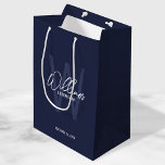 Navy Blue Script Personalized Groomsmen Medium Gift Bag<br><div class="desc">Modern Minimalist Personalized Monogram and Name Gifts This design features personalized name in white modern handwriting script font style and monogram in light navy blue modern sans serif font style as background, with wedding details in white modern sans serif font style, on navy blue background. Also perfect for best man,...</div>
