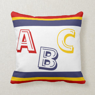 navy blue, yellow, and red ABC on white Throw Pillow