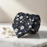 Navy Floral Tie<br><div class="desc">Elevate your style with poetic elegance using this breathtaking midnight navy necktie blooming with delicate florals! A graceful pattern of petite white blossoms, shimmering gold and beige foliage, slender stems, tiny leaves, and airy botanical sprigs creates a luxurious, vintage-inspired meadow scene against a deep, rich navy background. This sophisticated yet...</div>
