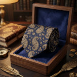 Navy Gold Paisley Classic Baroque Pattern Tie<br><div class="desc">Elevate every occasion with timeless opulence in this stunning midnight navy paisley necktie. Rich golden paisley swirls, filled with intricate floral details and subtle accents, flow elegantly across a deep luxurious navy background, creating a high-end, heritage-inspired pattern that radiates quiet grandeur and refined sophistication. This classic masterpiece blends vintage European...</div>