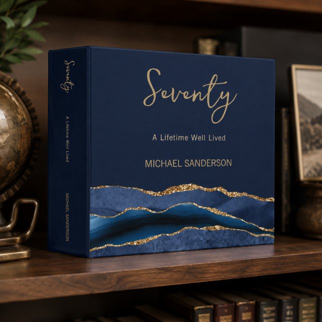 Navy Gold Seventy Memory Binder (Luxury navy and gold memory binder displayed on a masculine bookshelf setting.)