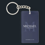 Navy Personalized Groomsmen's name and monogram Keychain<br><div class="desc">Add a personal touch to your wedding with personalized groomsmen keychain. This keychain features personalized groomsman's name with title and wedding date in white and monogram in light navy blue as background, in classic serif font style, on navy blue background. Also perfect for best man, father of the bride, ring...</div>