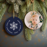 Navy Winter Snowflake First Christmas Keepsake Ceramic Ornament<br><div class="desc">Ceramic holiday ornament personalized with your baby's photo and custom "My First Christmas" text. This simple modern holiday design features a white snowflake on a navy blue background. Use the design tools to choose any background colour, edit text fonts and colours and add your own photos to create your own...</div>