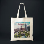 Nebraska City Skyline Omaha Tote Bag<br><div class="desc">Omaha Nebraska City Skyline
This is great for the corn husker in your life. Beautiful city scape with blue skies and green trees.</div>