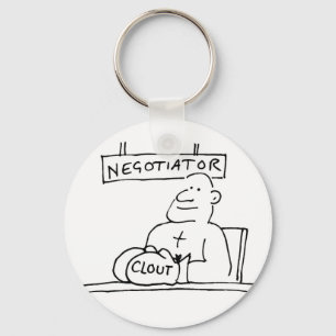 Negotiator at Desk has Boxing Glove with Clout Keychain