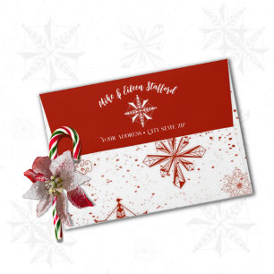 Neige rouge sur enveloppe en toile blanche