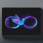 Neon Infinity Symbol with Glowing Hummingbird Plaque<br><div class="desc">Glowing,  purple infinity symbol with flying,  luminous,  blue hummingbird on black background. Neon.</div>