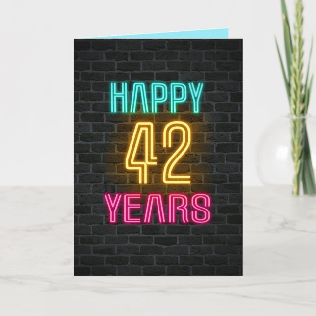 Neon sign on brick for 42nd birthday card (Front)