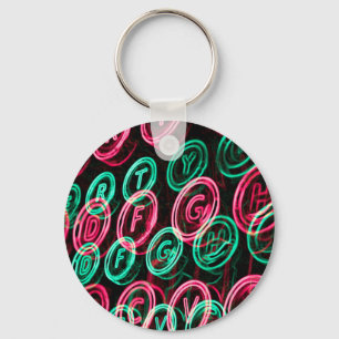 Neon typewriter keys close up keychain