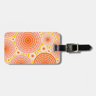 Nested wheels - orange and gold luggage tag
