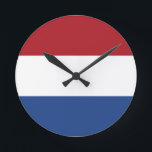 netherlands round clock<br><div class="desc">Flag of the Netherlands. The flag of the Netherlands is a horizontal tricolour of red, white, and blue. It harks back to Charlemagne's time. Variants of the flag have been in use since 1572 and in 1937 the flag was officially formalized as the national flag of the Netherlands and of...</div>
