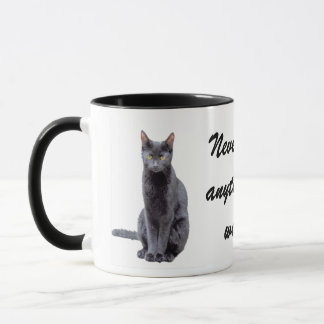 Never feed your cat... mug