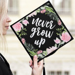 Never Grow Up Pink Floral Wreath Graduation Cap Topper<br><div class="desc">Celebrate your graduation day in style with our chic Never Grow Up graduation cap topper. The custom graduation cap topper features a pink floral watercolor border and "never grow up" in a trendy script font.</div>