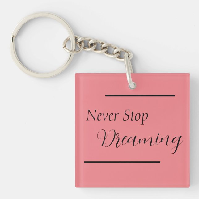 "Never Stop Dreaming" Phrase Black Lettering  Keychain (Front)