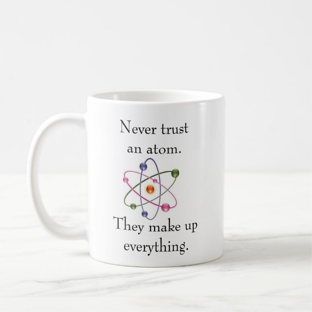 never trust an atom coffee mug (Left)