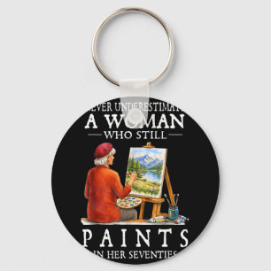 Never underestimate a woman who still paints keychain