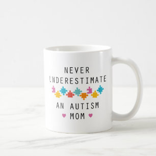 Never Underestimate An Autism Mom Coffee Mug