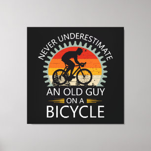 Never Underestimate An Old Guy On A Bicycle Canvas Print