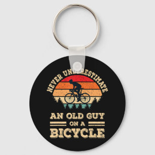 Never Underestimate An Old Guy On A Bicycle Funny  Keychain