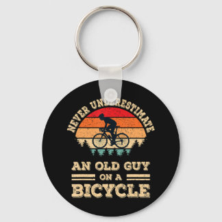 Never Underestimate An Old Guy On A Bicycle Funny Keychain