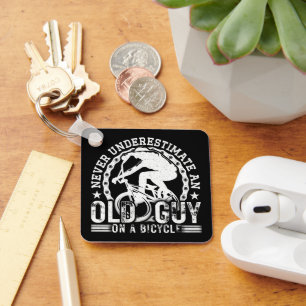 Never Underestimate An Old Guy On A Bicycle Funny Keychain