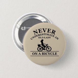 Never underestimate an old lady on a bicycle  2 inch round button