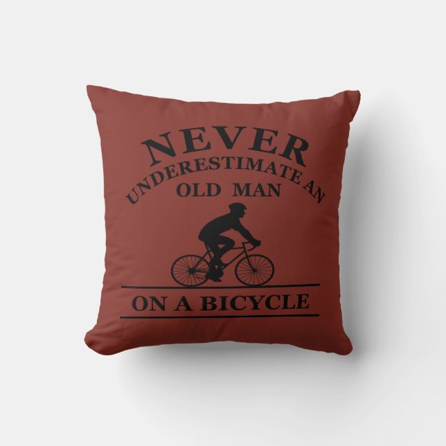 never underestimate an old man on a bicycle throw pillow (Front)